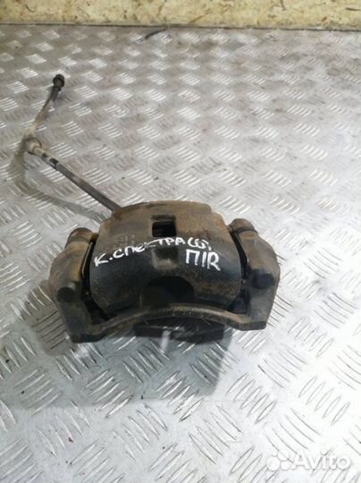 Суппорт тормозной передний правый Kia Spectra LD