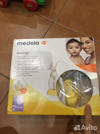 Молокоотсос medela swing