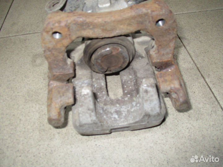 Суппорт задний левый Citroen C4