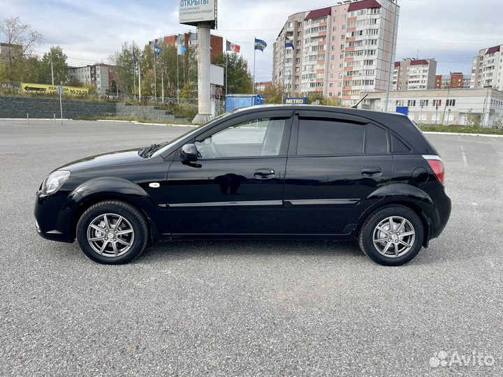 Kia Rio 1.4 МТ, 2011, 146 222 км