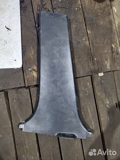 06801741 Geely Emgrand Обшивка стойки левой