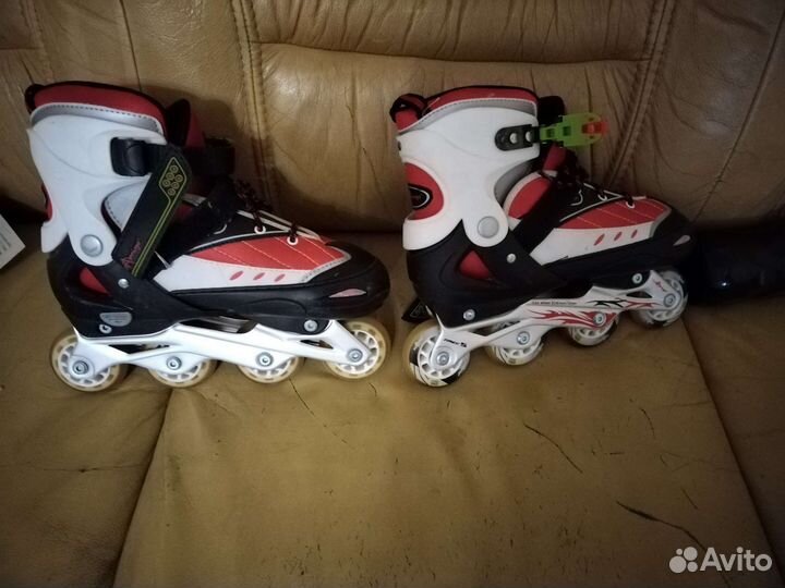 Роликовые коньки