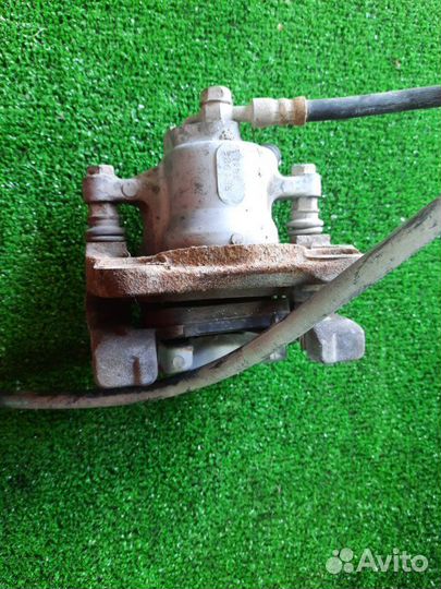 Суппорт тормозной задний левый Toyota Camry GSV40