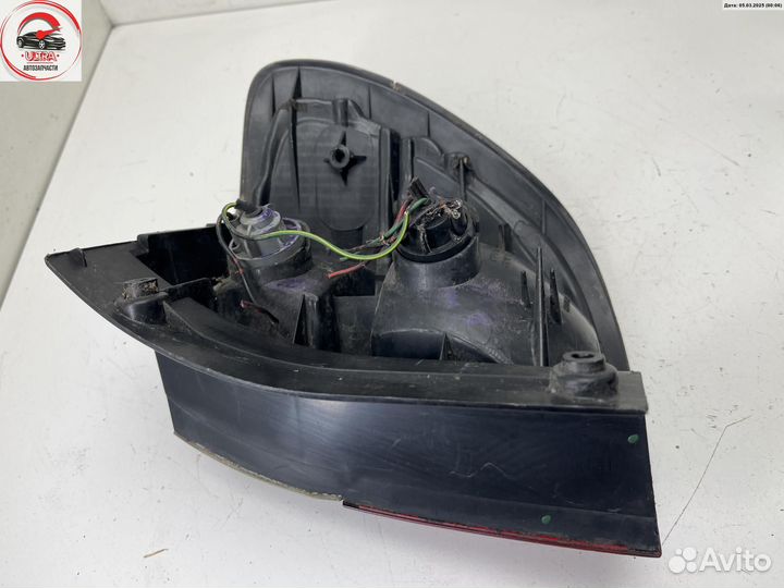 Фонарь задний левый б/у Mazda 626 (1997-2002) GF/GW