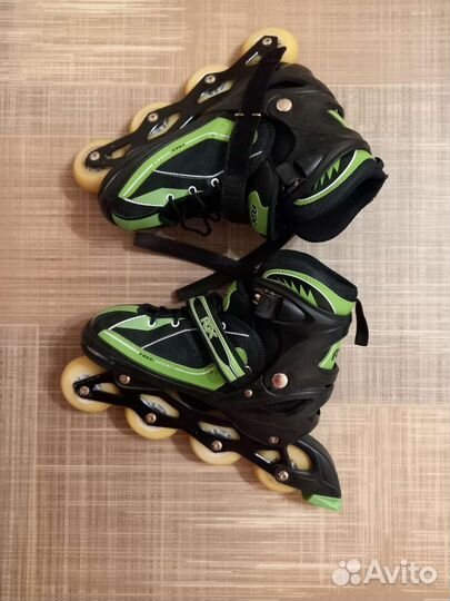 Роликовые коньки