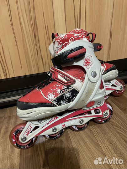 Роликовые коньки