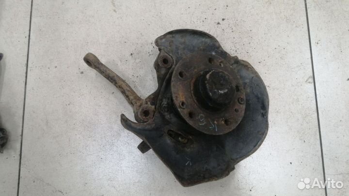 Кулак поворотный в сборе передний правый