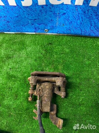 Суппорт тормозной задний левый Mazda 6 GH L813