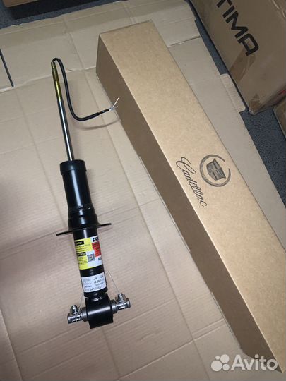 Амортизатор передний Cadillac Escalade 4