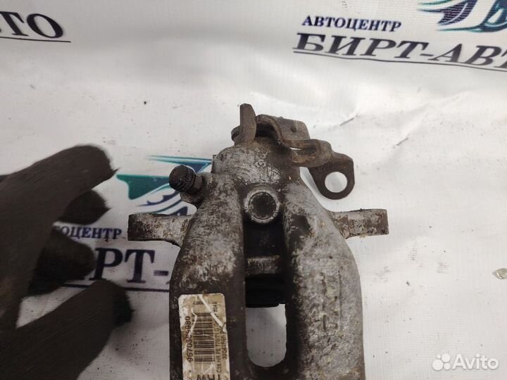 Суппорт тормозной задний левый Peugeot 308 I (2007—2011)