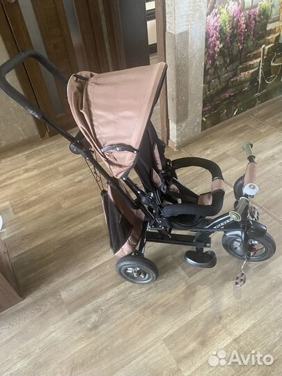 Трехколесный велосипед с ручкой