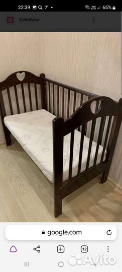 Детская кроватка с маятником