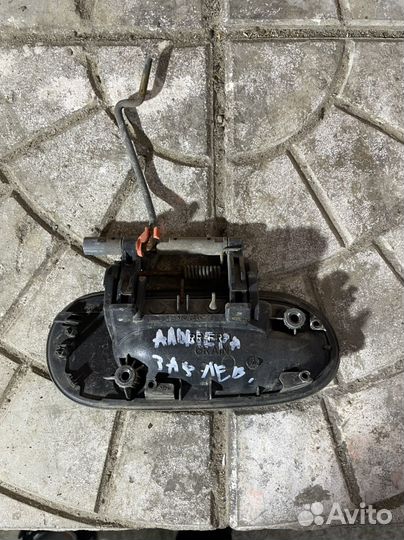 Наружная ручка задней двери Nissan Almera N16