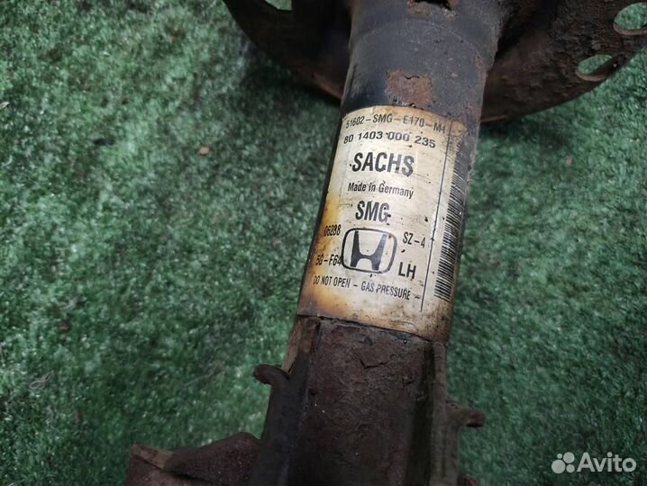 Стойка амортизатора передняя левая Honda Civic 5D