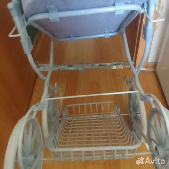 Игрушечная коляска для кукол