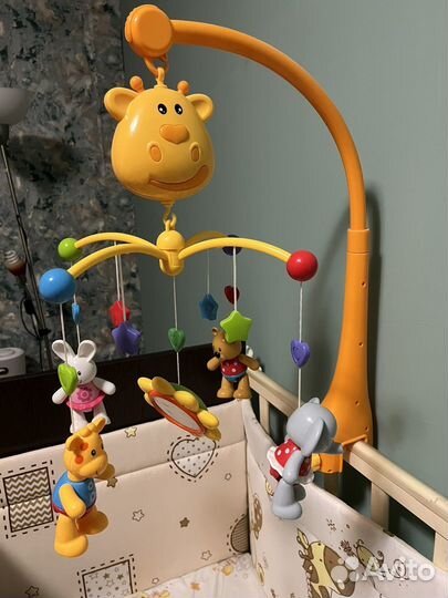 Детский мобиль в кроватку музыкальный