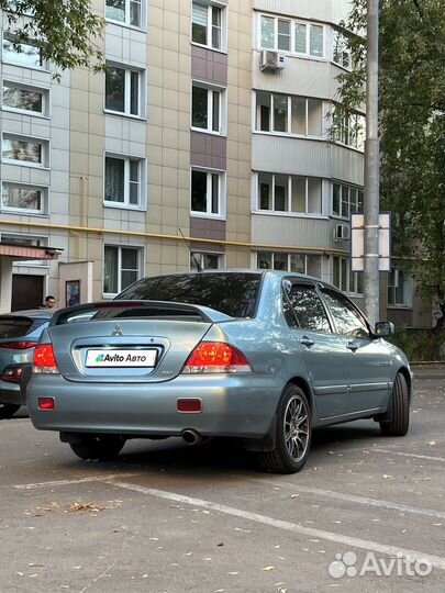 Mitsubishi Lancer 1.6 МТ, 2006, 91 500 км