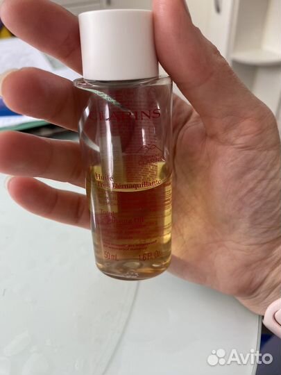 Total cleansing oil clarins масло