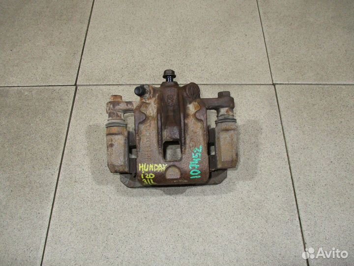 Суппорт задний левый Hyundai i20 (PB)