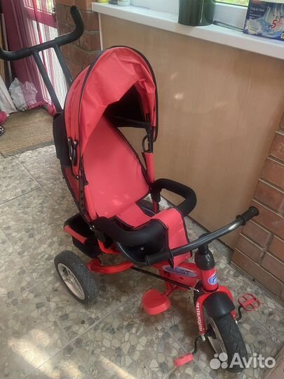 Трехколесный велосипед с ручкой