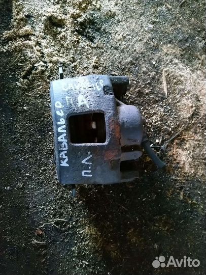 Суппорт передний chevrolet cavalier R,L