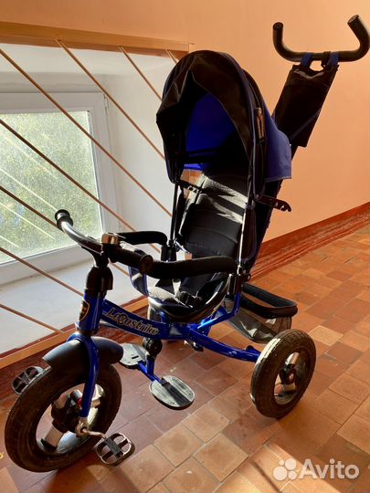 Детский трехколесный велосипед с толкателем