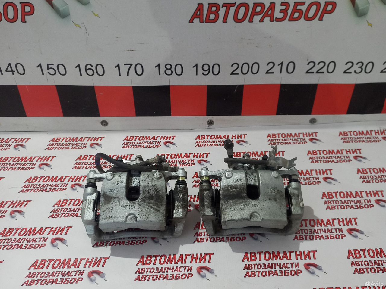 Супорт тормозной передний Киа Спортейдж 5 NQ5