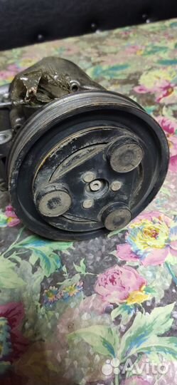 Компрессор кондиционера Lancer Cedia