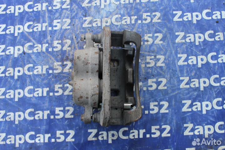 Суппорт передний левый Киа Соренто