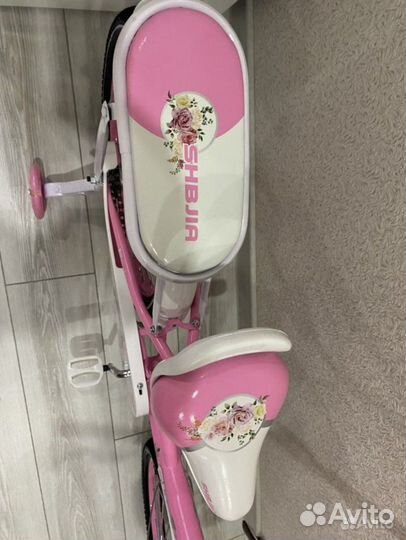 Велосипед новый розовый 20R