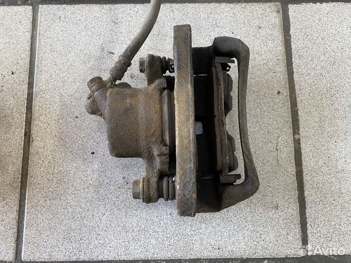 Суппорт передний Mitsubishi Lancer VII