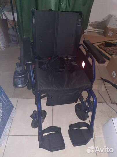 Инвалидная коляска с электроприводом