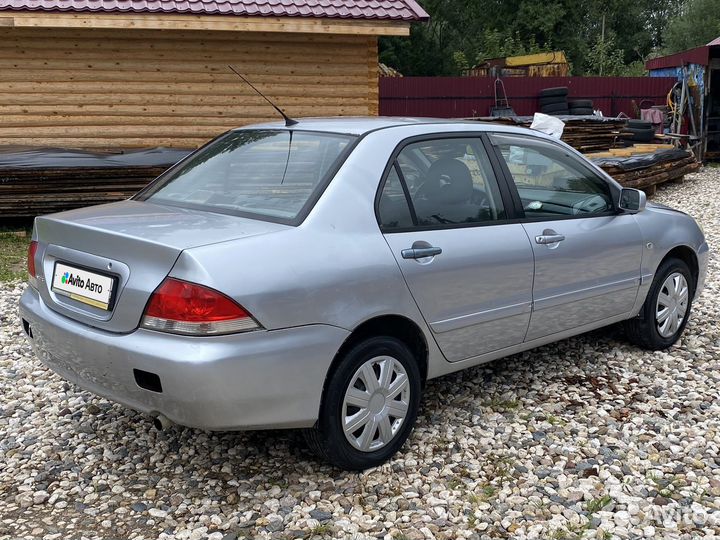 Mitsubishi Lancer 1.6 МТ, 2005, 331 000 км