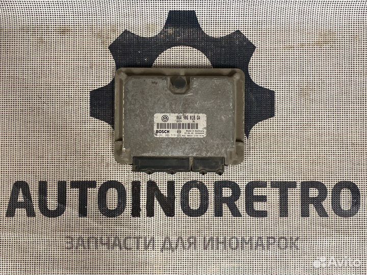 Блок управления двигателем Skoda 06A906018GA