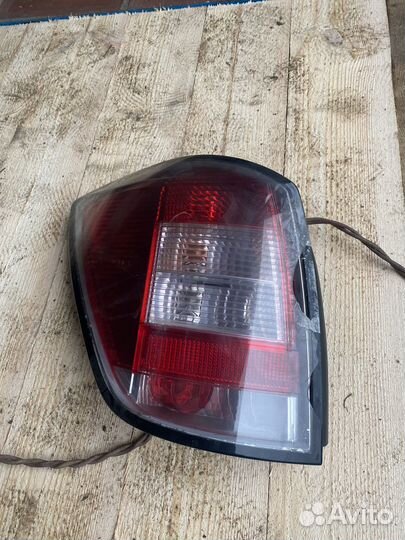 Фонарь Опель астра h Универсал левый