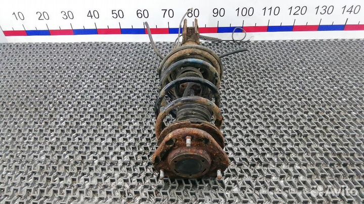 Стойка амортизатора переднего правого Toyota Corol