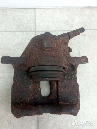 Суппорт тормозной передний правый Renault Espace 3