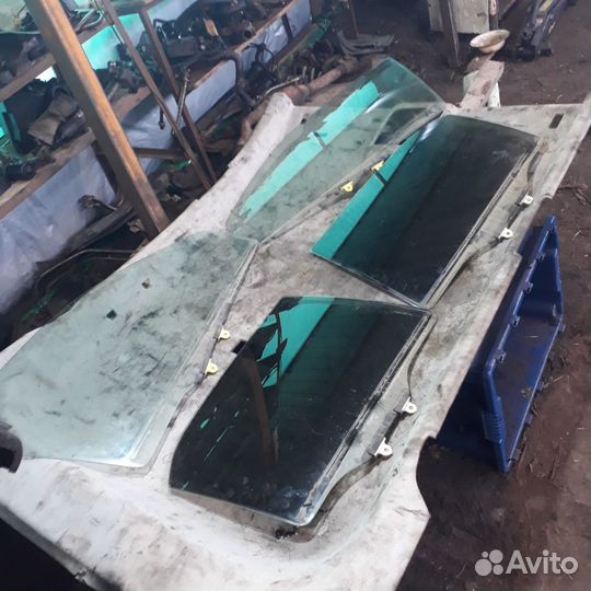 Стекло боковой двери Мицубиси Лансер 9