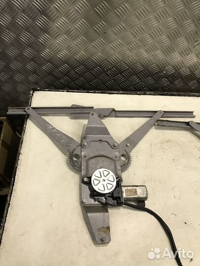 Стеклоподъемник Renault Logan универсальный