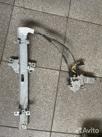 Стеклоподъемник передний левый Kia Spectra