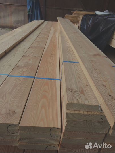 Доски лиственницы: прочный строительный материал