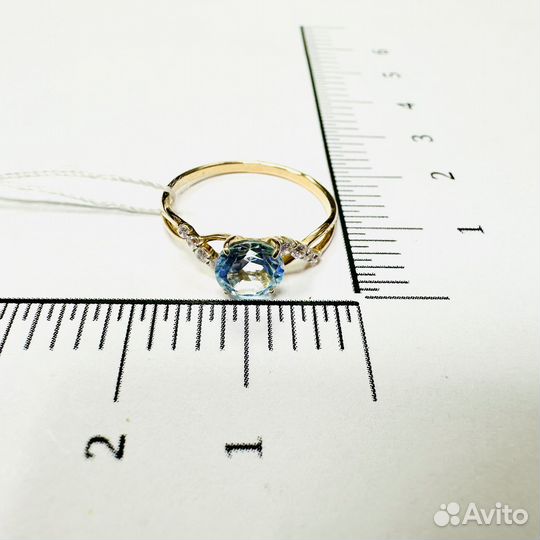 Золотые кольца с топазами