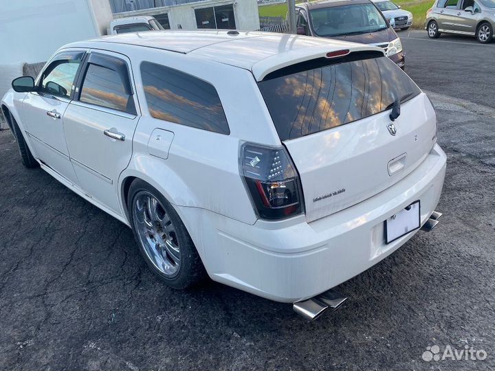 Амортизатор двери на Dodge Magnum