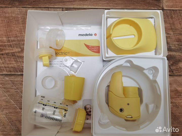 Молокоотсос medela электрический