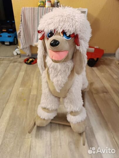 Собака качалка