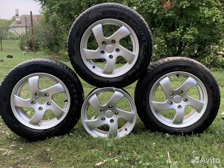 Диски литые mazda r15