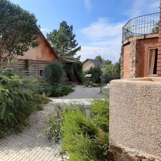 Дом 291 м² на участке 14,2 сот.