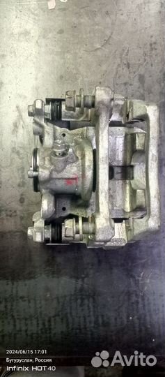 Суппорт тормозной задний левый Ленд Крузер 300