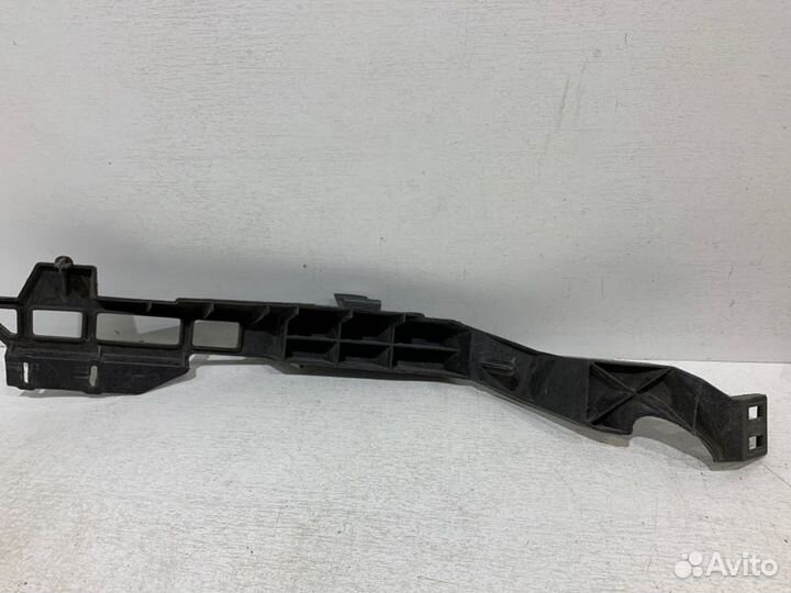 Кронштейн бампера передний правый Opel Astra J