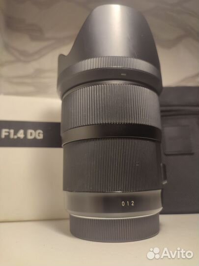 Объектив Sigma 35mm f/1.4 ART Canon Комплект